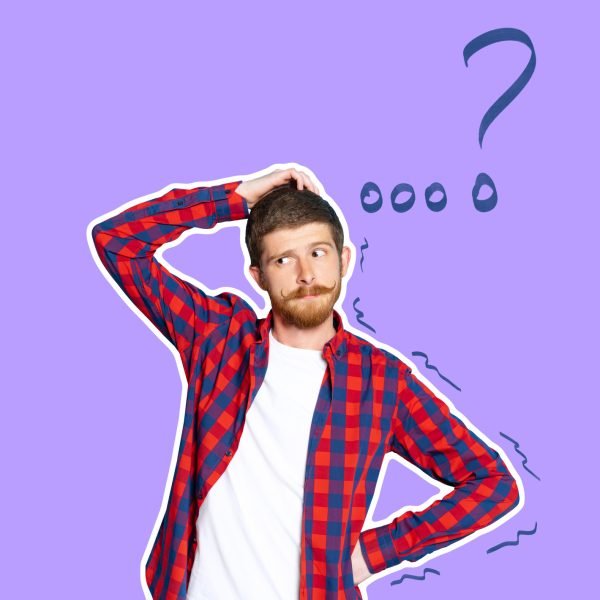 Question. Young thoughtful guy has doubts, standing on purple background. Concept of human emotions, facial expression, youth, education, business, ad. Model in plaid shirt on blue background